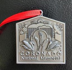 A metal ornament with the words Coronado National Memorial.