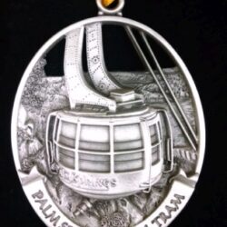 Silver medallion ornament of Palm Springs tram