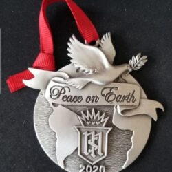 Peace on earth locket with a red ribbon