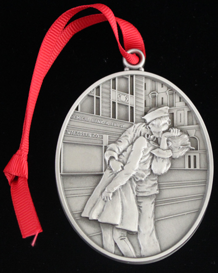Pewter ornament depicting the famous VJ Day kiss.