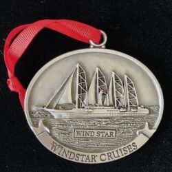 Wind star cruises locket with a ship design